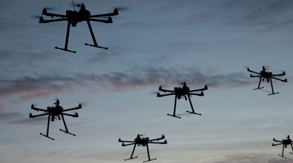 View of sky full of flying drones
