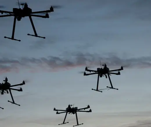 View of sky full of flying drones