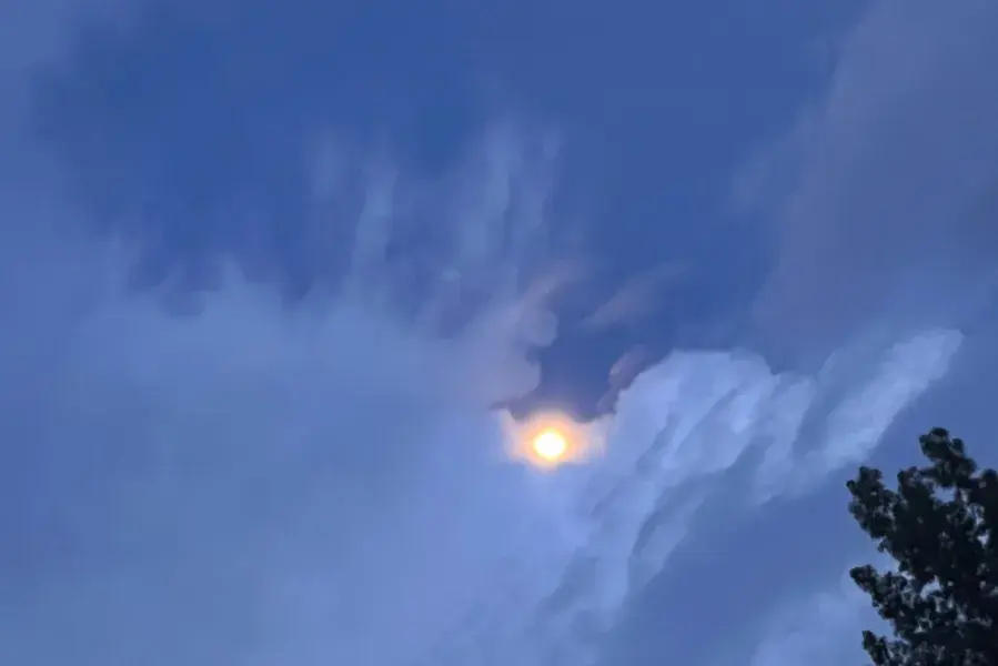 Sun peaking through clouds